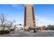 High-rise building exterior with landscaping and entrance at 100 Park W Ave # 1804, Denver, CO 80205