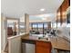 Open kitchen overlooking the living area with city views at 100 Park W Ave # 1804, Denver, CO 80205