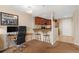 Small galley kitchen with breakfast bar and built in desk at 100 Park W Ave # 1804, Denver, CO 80205