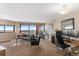 Living room with city views and modern furniture at 100 Park W Ave # 1804, Denver, CO 80205