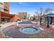 Relaxing outdoor space with pool, hot tub, and lounge area at 100 Park W Ave # 1804, Denver, CO 80205