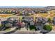 Aerial view of a neighborhood in the fall with bright colorful trees at 11023 Glengate Cir, Highlands Ranch, CO 80130