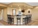 Spacious basement bar area featuring granite countertops and seating for up to six people at 11023 Glengate Cir, Highlands Ranch, CO 80130