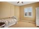 Bedroom with a neutral color palette, single bed, and a single window at 11023 Glengate Cir, Highlands Ranch, CO 80130