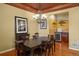 Elegant dining room featuring hardwood floors and stylish chandelier at 11023 Glengate Cir, Highlands Ranch, CO 80130