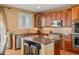 Well-equipped kitchen with granite countertops and stainless steel appliances at 11023 Glengate Cir, Highlands Ranch, CO 80130