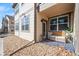 Charming covered patio seating area ideal for enjoying the outdoors with views of the community at 4604 Copeland Cir # 101, Highlands Ranch, CO 80126