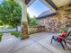 Cozy front porch with stone accents and comfortable seating area at 1020 S Ammons Cir, Lakewood, CO 80226