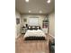 Well-lit bedroom featuring neutral tones, a comfortable bed, and practical furnishings with lots of room to move around at 3173 Youngheart Way, Castle Rock, CO 80109