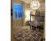 Charming bedroom with bunk beds, a whimsical light fixture, and natural light from the nearby window at 3173 Youngheart Way, Castle Rock, CO 80109