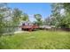 Large backyard with a deck and ample space for outdoor enjoyment at 4678 S Lewiston Way, Aurora, CO 80015