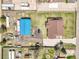 Captivating aerial view of a home featuring a barn and expansive grounds at 5365 Eldridge St, Arvada, CO 80002