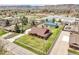 Gorgeous aerial view of a home surrounded by trees with plenty of space and a large barn at 5365 Eldridge St, Arvada, CO 80002