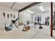 Finished basement gym featuring a variety of workout equipment and accessories at 5365 Eldridge St, Arvada, CO 80002