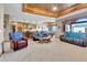 Open concept living room with views of the kitchen and dining area at 5365 Eldridge St, Arvada, CO 80002