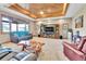 Spacious living room with wood ceiling and plush furnishings at 5365 Eldridge St, Arvada, CO 80002