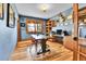 A spacious home office with wooden floors and ample built-in storage at 5365 Eldridge St, Arvada, CO 80002