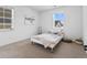 Inviting bedroom with a comfortable bed, soft textures, and bright natural light at 175 Westerly Blvd, Erie, CO 80516