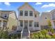 Charming two-story home with a covered porch, beautiful landscaping, and a welcoming entrance at 175 Westerly Blvd, Erie, CO 80516