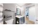 Well-lit bathroom featuring a stylish vanity and essential fixtures in a modern design at 19730 E 58Th Pl, Aurora, CO 80019