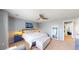 Inviting bedroom featuring a comfortable bed, soft neutral tones, and ample natural light at 19730 E 58Th Pl, Aurora, CO 80019