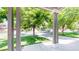 View from the front porch looking out onto a tree-lined street with green lawns at 19730 E 58Th Pl, Aurora, CO 80019