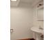 Clean bathroom featuring a pedestal sink and ample wall space at 13190 Coyote Song Trl, Conifer, CO 80433