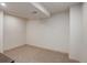 Neutral empty room ready for customization with plush carpet and white walls at 13190 Coyote Song Trl, Conifer, CO 80433