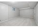 A finished basement room with neutral carpet and ample lighting from a small window at 6874 S Detroit Cir, Centennial, CO 80122