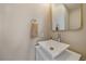 Modern bathroom with contemporary sink and gold accents at 3323 W Hayward Pl, Denver, CO 80211