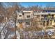 Modern two-story home with stone accents and a private balcony at 3323 W Hayward Pl, Denver, CO 80211