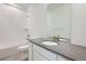 Stylish bathroom featuring a shower/tub combination, sleek vanity, and modern fixtures at 4599 Windmill Dr, Brighton, CO 80601