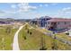 A sprawling backyard with a path for a refreshing walk at 4992 Trails Edge Ln, Castle Rock, CO 80104
