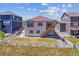 Backyard view of home with well maintained fenced yard at 4992 Trails Edge Ln, Castle Rock, CO 80104