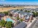 An aerial view showcasing the community's layout, amenities, pool and beautiful landscaping at 4100 Albion St # 612, Denver, CO 80216