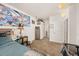 Bedroom with neutral carpet, large wall decor and window providing natural light at 4100 Albion St # 612, Denver, CO 80216