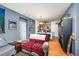 Inviting living room leading to the kitchen, bathed in natural light and hardwood floors at 4100 Albion St # 612, Denver, CO 80216