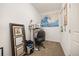 Functional office space with neutral carpet, decor, standup desk, and natural light from the window at 4100 Albion St # 612, Denver, CO 80216