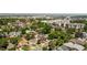 Aerial view of the neighborhood showcasing tree-lined streets and nearby buildings at 3755 S Sherman St, Englewood, CO 80113