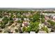 Aerial view of the neighborhood showcasing tree-lined streets and nearby buildings at 3755 S Sherman St, Englewood, CO 80113