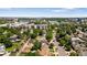 Aerial view of the neighborhood showcasing tree-lined streets and nearby buildings at 3755 S Sherman St, Englewood, CO 80113