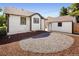 Backyard featuring a new circular patio area and manicured lawn at 3755 S Sherman St, Englewood, CO 80113