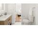 Bathroom with wood vanity and toilet at 3755 S Sherman St, Englewood, CO 80113