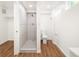 Stylish bathroom features a shower stall and a toilet with new flooring at 3755 S Sherman St, Englewood, CO 80113