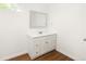 Bright bathroom with new white vanity and light-up mirror at 3755 S Sherman St, Englewood, CO 80113