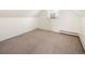 Neutral bedroom featuring bright windows and a radiator at 3755 S Sherman St, Englewood, CO 80113