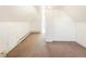 A bright, empty bedroom featuring a radiator and multiple windows at 3755 S Sherman St, Englewood, CO 80113