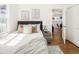 Bedroom with neutral decor and an ensuite bathroom at 3755 S Sherman St, Englewood, CO 80113