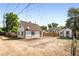 Exterior showing a house, fenced yard and a detached garage at 3755 S Sherman St, Englewood, CO 80113