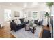Spacious living room featuring a comfortable seating arrangement and views to other areas at 3755 S Sherman St, Englewood, CO 80113
